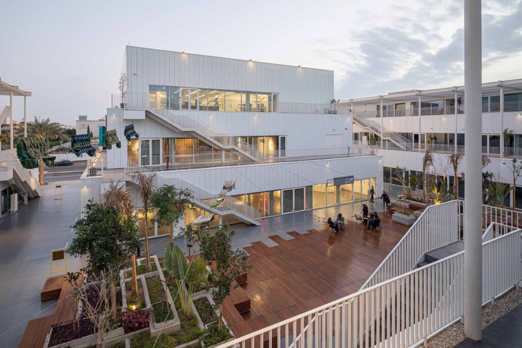 Courtyard of Hayy Jameel in Jeddah, showing the multi-level cultural complex designed by waiwai with open terraces and community spaces.